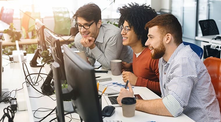 Employees smile using new white label HR software solutions.