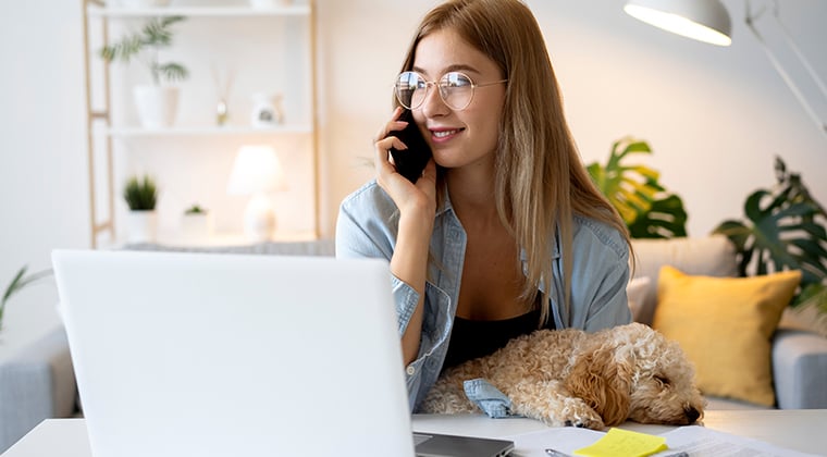 A HiringThing employee smiles after hearing they won a Best in Biz Award