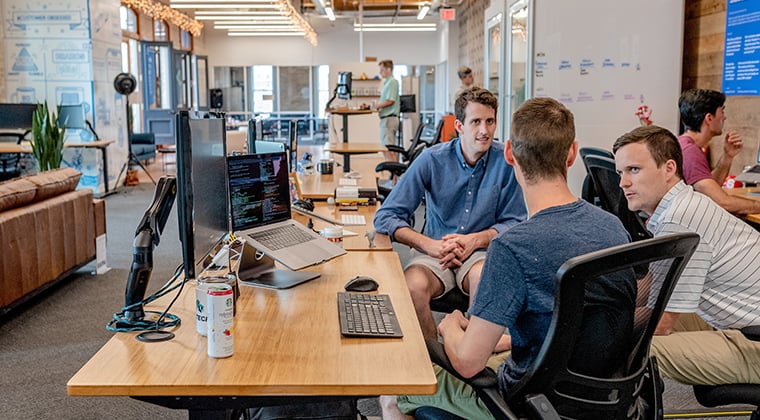 Some association employees brainstorm on how to overcome challenges. 