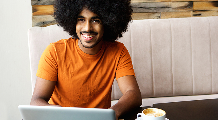 Smiling employer running automated reference checks