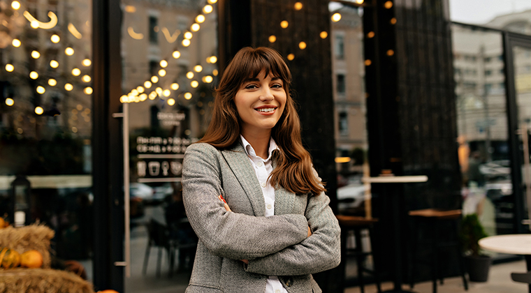 Happy product manager smiling about her success